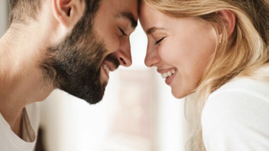 Close Up Of A Beautiful Happy Young Couple Relaxing